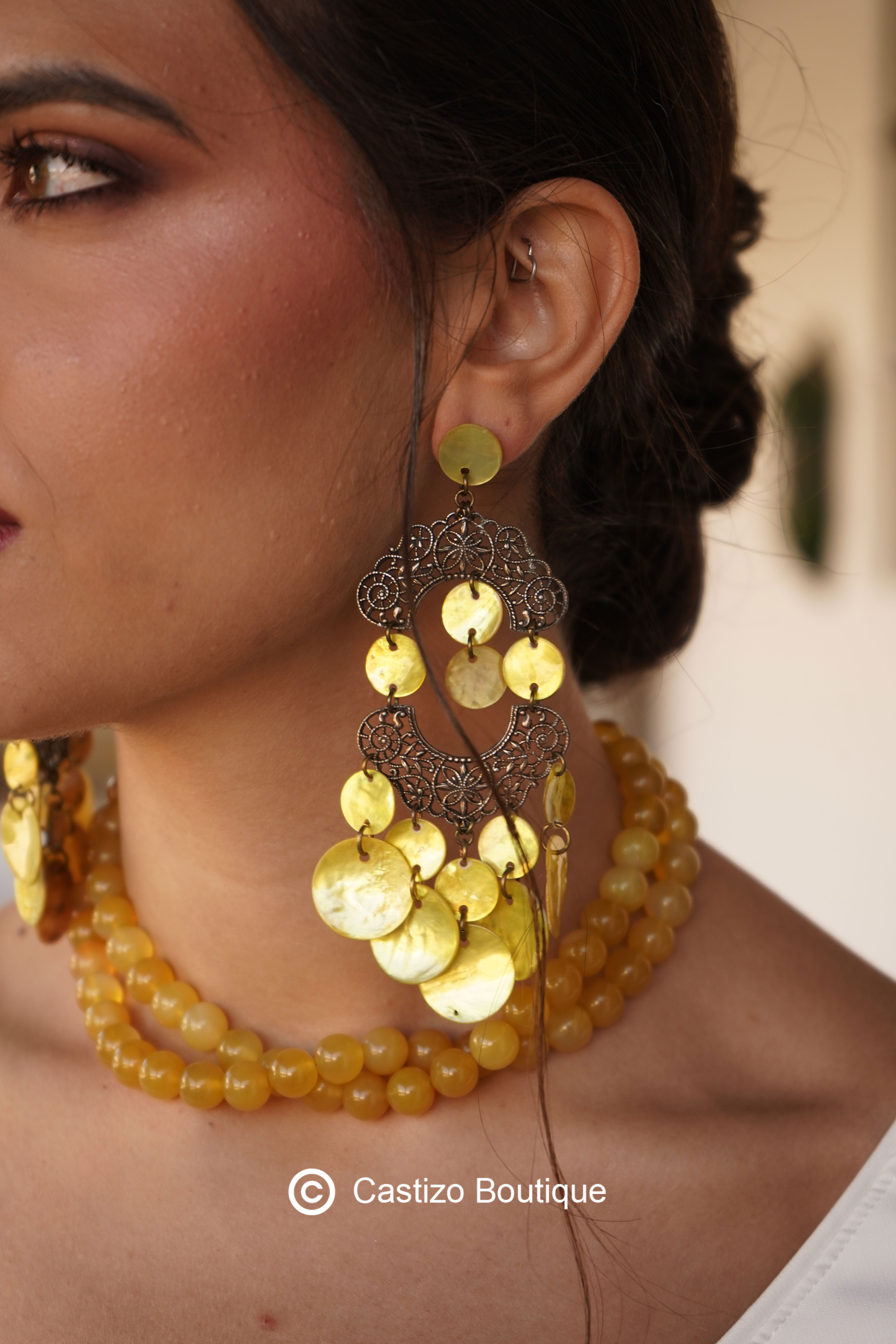 Pendiente lima escamas