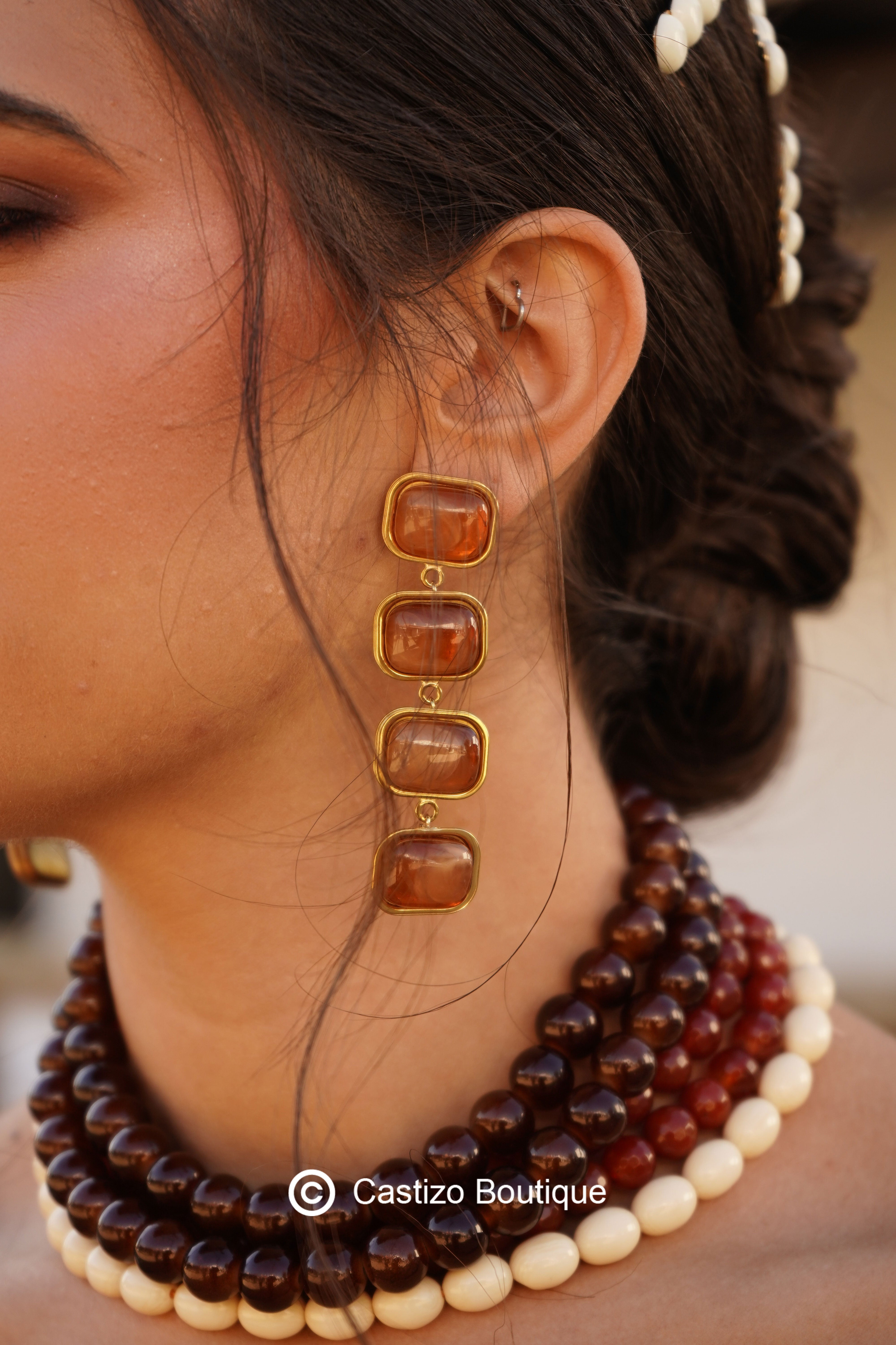 Pendiente miel largo