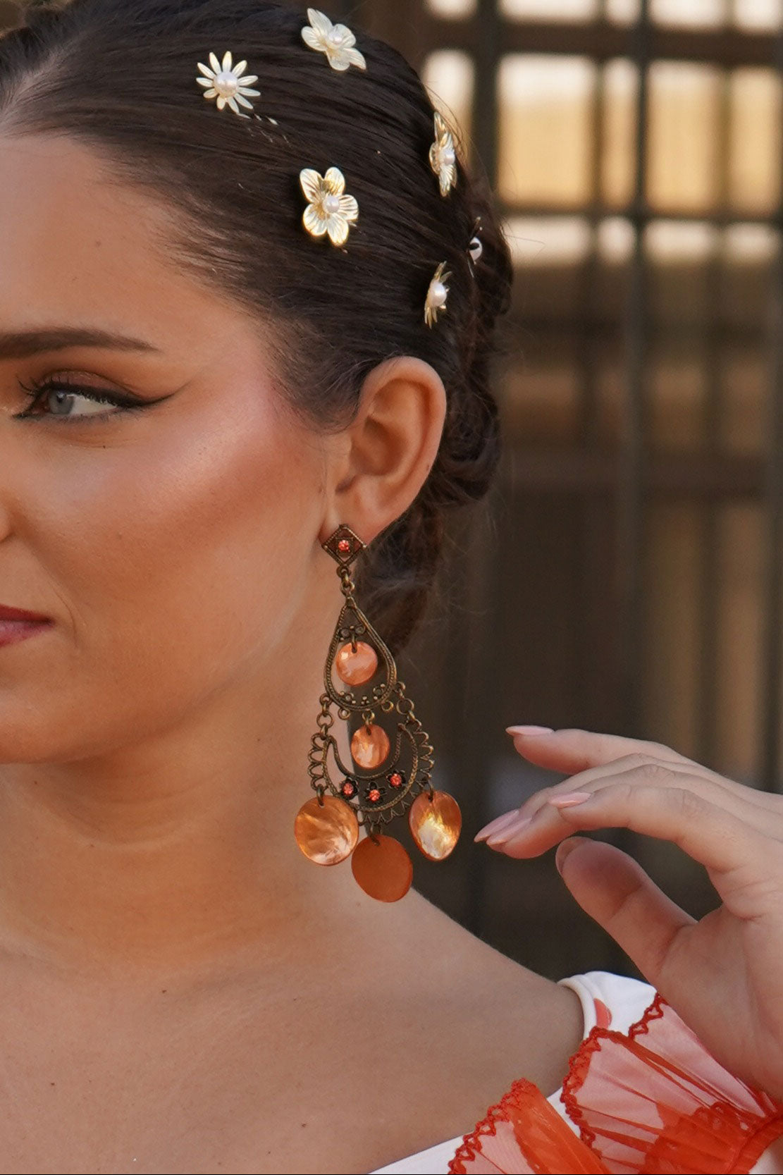 Pendiente naranja escamas